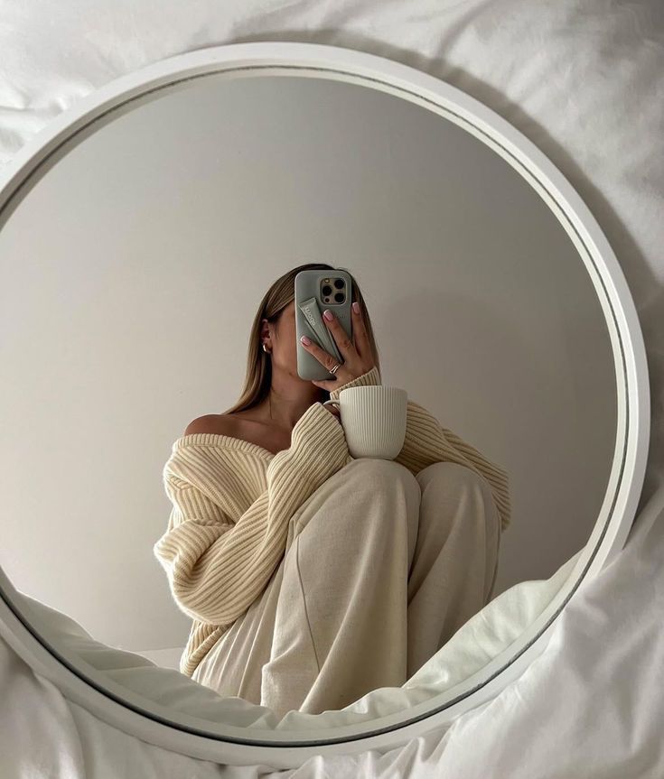 A cozy Swedish Fika moment with coffee and a mirror selfie.